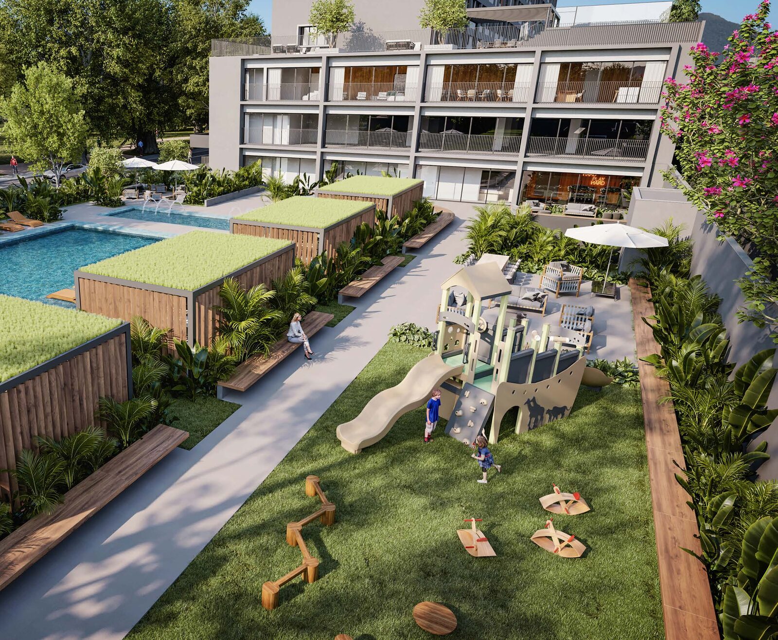 Playground no jardim com edifício ao fundo